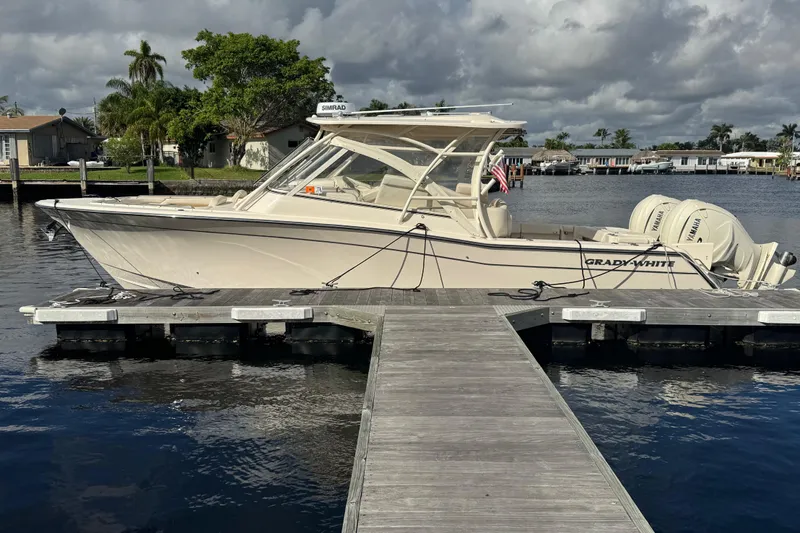 Texas Crewed Yacht Photos Pics 2024 Grady-White Freedom 335 boat docked on a sunny day.
