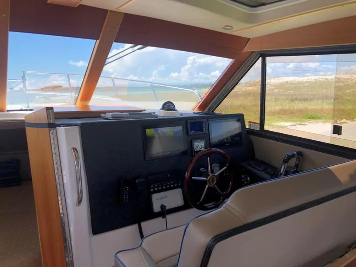  Yacht Photos Pics Interior of 2025 Cutwater C-32 Sedan boat with modern navigation controls.