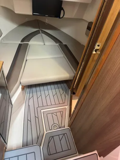 Yacht Photos Pics 2023 Solara S-310 CW cabin interior with modern design and comfortable seating.