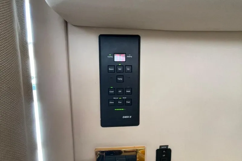 Double Kickback IV Yacht Photos Pics Control panel on 1998 Sea Ray 480 Sedan Bridge yacht interior.