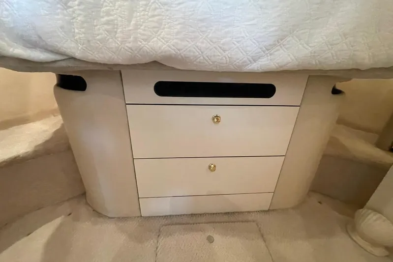 Double Kickback IV Yacht Photos Pics Interior cabin storage on 1998 Sea Ray 480 Sedan Bridge yacht.