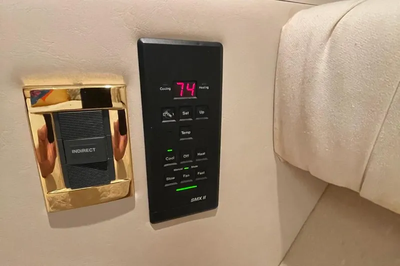 Double Kickback IV Yacht Photos Pics Control panel on a 1998 Sea Ray 480 Sedan Bridge yacht interior.