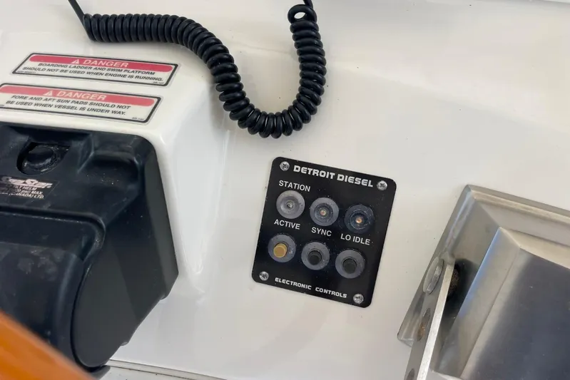 Double Kickback IV Yacht Photos Pics Control panel of a 1998 Sea Ray 480 Sedan Bridge with Detroit Diesel electronic controls.