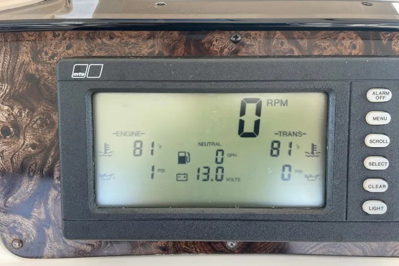 Double Kickback IV Yacht Photos Pics Dashboard display of a 1998 Sea Ray 480 Sedan Bridge showing engine and transmission data.