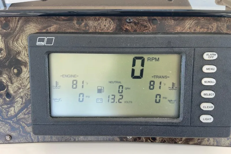 Double Kickback IV Yacht Photos Pics Dashboard of a 1998 Sea Ray 480 Sedan Bridge showing engine and transmission data.