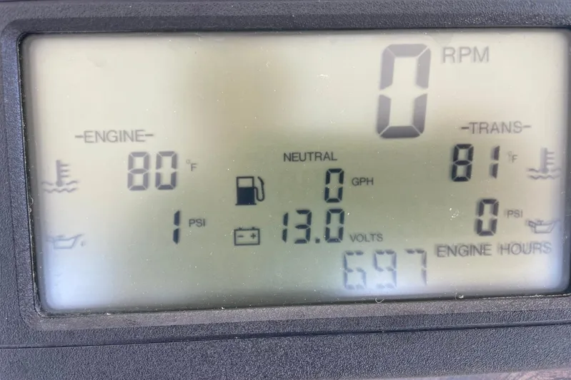 Double Kickback IV Yacht Photos Pics Dashboard display of a 1998 Sea Ray 480 Sedan Bridge showing engine and transmission data.