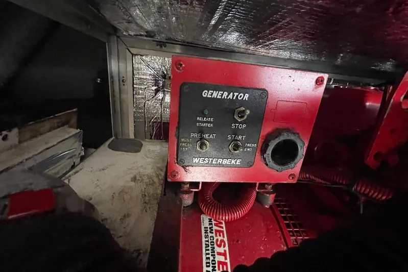 Double Kickback IV Yacht Photos Pics Westerbeke generator control panel on a 1998 Sea Ray 480 Sedan Bridge yacht.