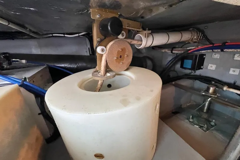 Double Kickback IV Yacht Photos Pics Engine room of 1998 Sea Ray 480 Sedan Bridge with visible components and wiring.