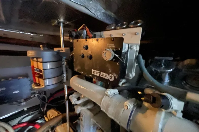 Double Kickback IV Yacht Photos Pics Engine room of 1998 Sea Ray 480 Sedan Bridge with diesel power components.