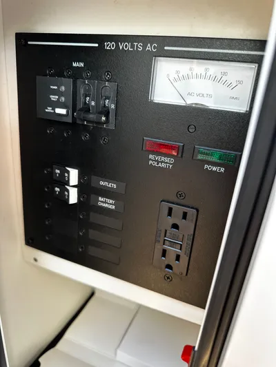  Yacht Photos Pics Electrical panel of 2023 Sea Ray 280 SLX boat, showing AC voltage and outlets.
