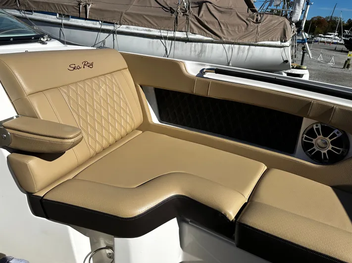  Yacht Photos Pics Luxurious seating on 2023 Sea Ray 280 SLX boat, featuring tan upholstery and stylish design.