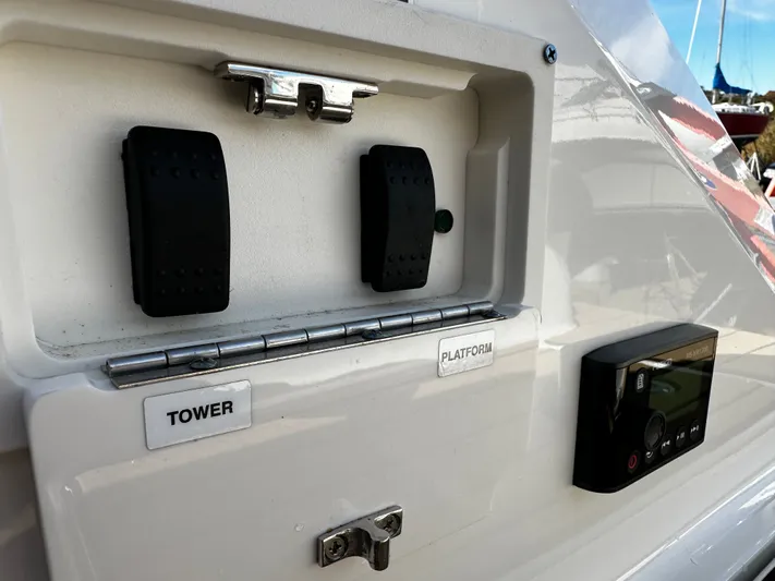  Yacht Photos Pics Control panel on a 2023 Sea Ray 280 SLX boat, featuring tower and platform switches.