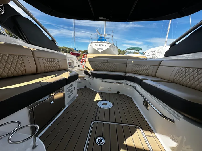  Yacht Photos Pics 2023 Sea Ray 280 SLX boat interior with luxurious seating and sleek design.