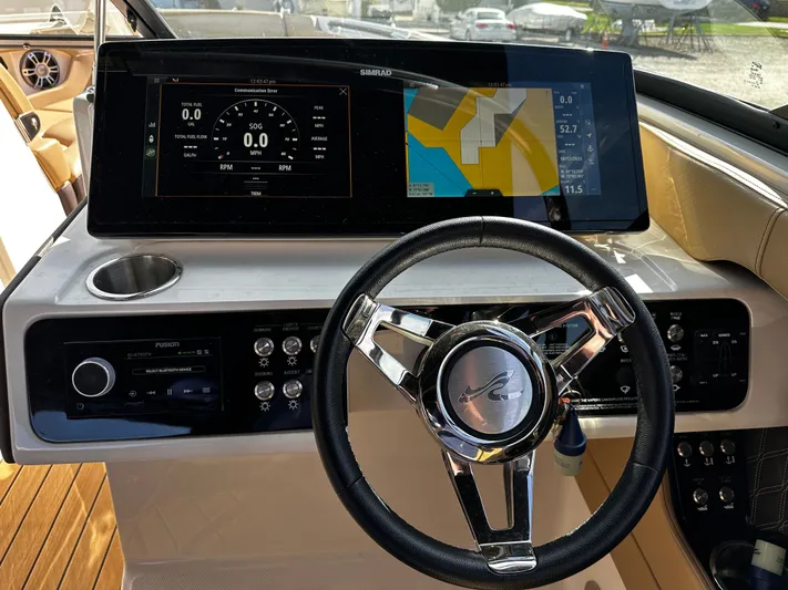  Yacht Photos Pics 2023 Sea Ray 280 SLX dashboard with steering wheel and digital display.
