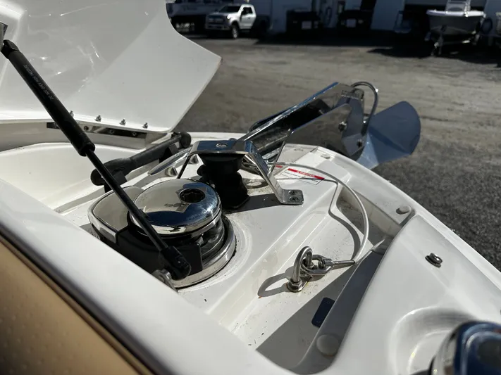  Yacht Photos Pics 2023 Sea Ray 280 SLX boat anchor system close-up in a marina setting.