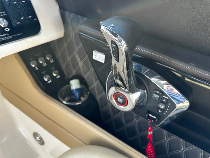  Yacht Photos Pics Throttle control panel of 2023 Sea Ray 280 SLX boat with quilted leather detailing.