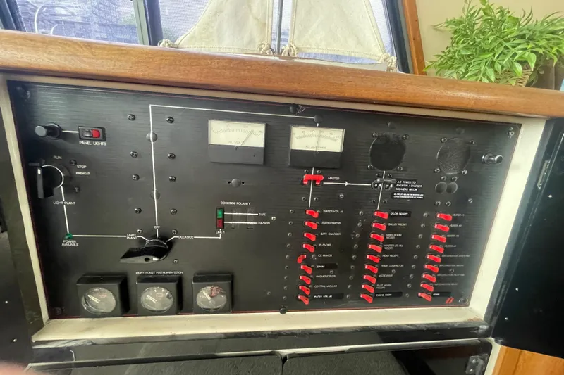  Yacht Photos Pics 1989 Bayliner Pilothouse 4588 control panel with switches and gauges.