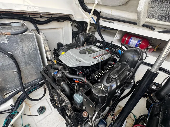 Max Dream Yacht Photos Pics Engine compartment of a 2014 Sea Ray 330 Sundancer with visible components and fire extinguisher.