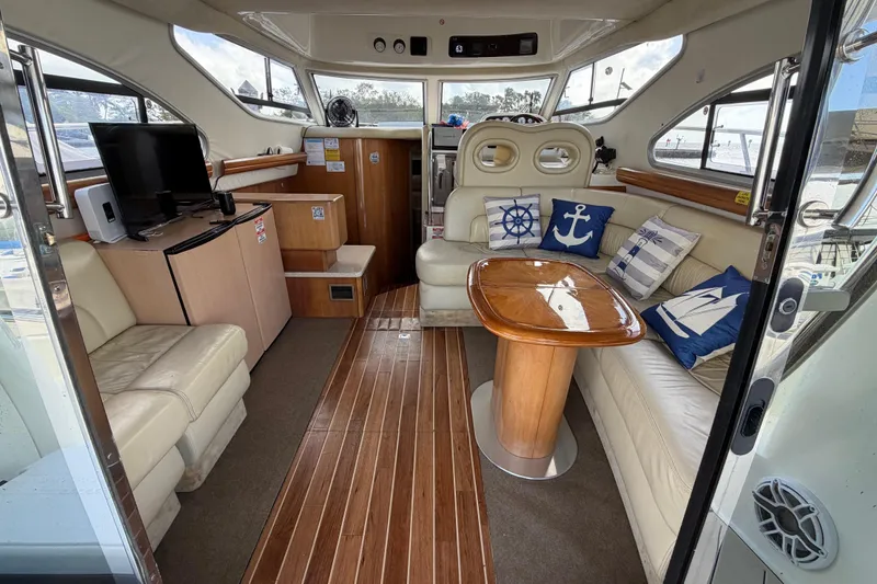  Yacht Photos Pics Luxurious 2007 Cranchi Atlantique 40 yacht interior with elegant seating and nautical decor.