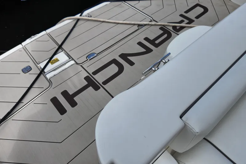  Yacht Photos Pics 2007 Cranchi Atlantique 40 yacht deck with branding and mooring line.