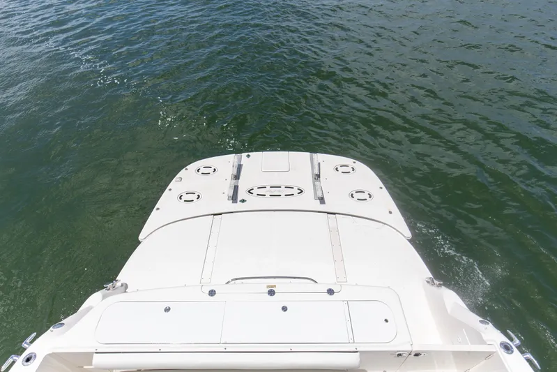 Reel Destiny Yacht Photos Pics 2007 Sea Ray 52 Sedan Bridge yacht on water, viewed from above.