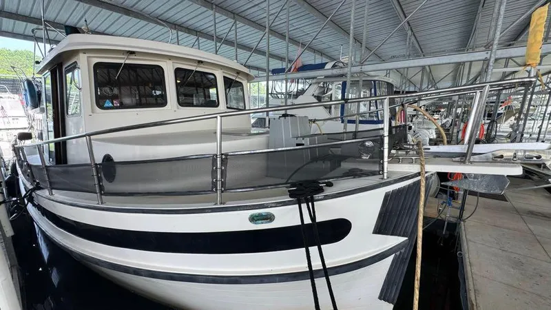 New Bearings Yacht Photos Pics 2000 Nordic Tug 42 Starboard Side