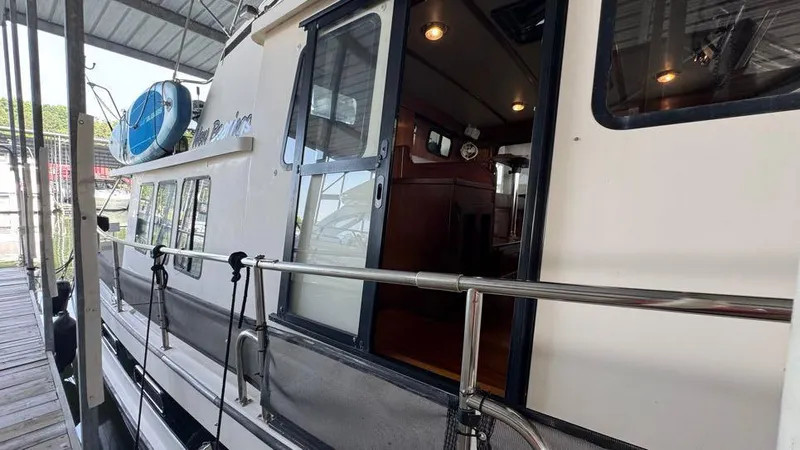 New Bearings Yacht Photos Pics 2000 Nordic Tug 42 Sliding Door to Pilothouse