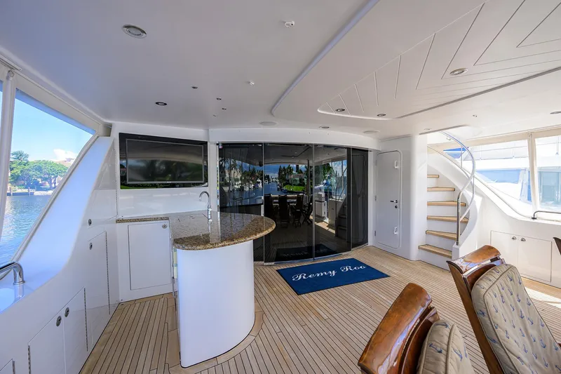 Remy Roo Yacht Photos Pics Luxurious interior of 2014 Westport 112 yacht with elegant seating and modern amenities.