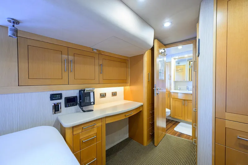 Remy Roo Yacht Photos Pics Luxurious interior of 2014 Westport 112 yacht with wooden cabinetry and modern amenities.