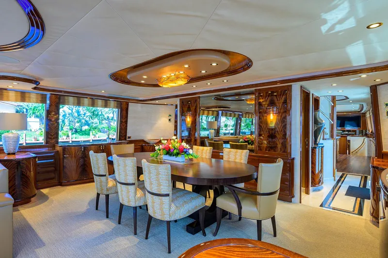 Remy Roo Yacht Photos Pics Luxurious interior of 2014 Westport 112 yacht with elegant dining area and modern decor.