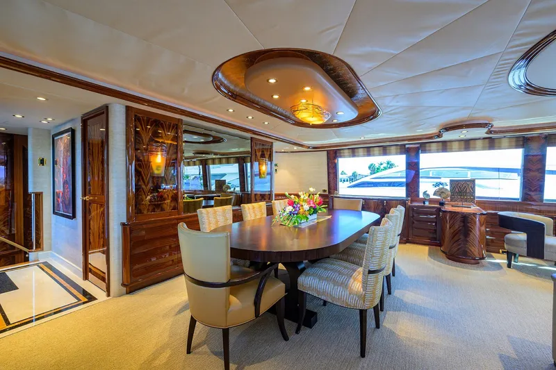 Remy Roo Yacht Photos Pics Luxurious interior of 2014 Westport 112 yacht with elegant dining area and modern decor.