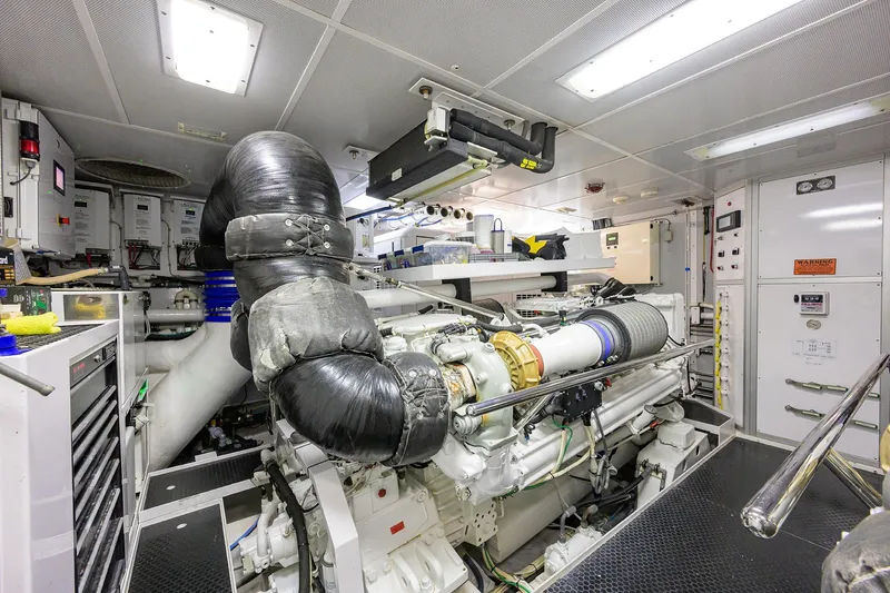 Remy Roo Yacht Photos Pics Engine room of 2014 Westport 112 yacht, featuring advanced machinery and equipment.