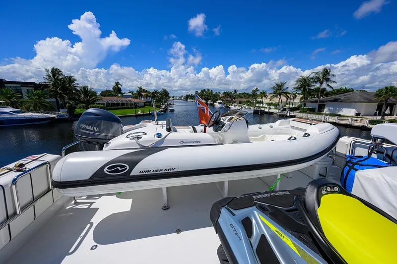 Remy Roo Yacht Photos Pics Luxury yacht Westport 112 (2014) with Walker Bay boat and jet ski on deck.