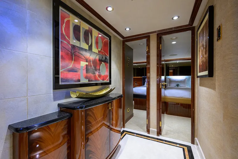 Remy Roo Yacht Photos Pics Luxurious interior hallway of 2014 Westport 112 yacht with modern art and elegant decor.