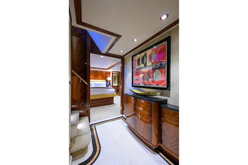 Remy Roo Yacht Photos Pics Luxurious interior of 2014 Westport 112 yacht featuring elegant woodwork and modern art.