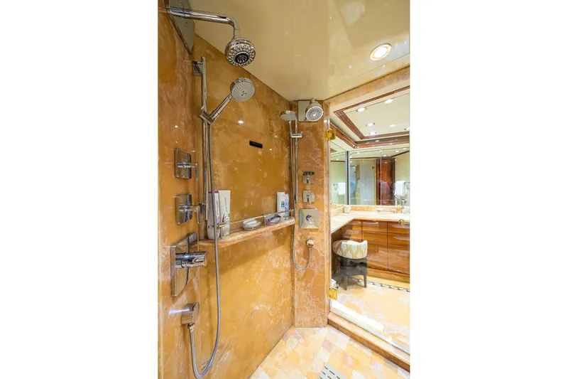 Remy Roo Yacht Photos Pics Luxurious bathroom in 2014 Westport 112 yacht with marble shower and elegant fixtures.