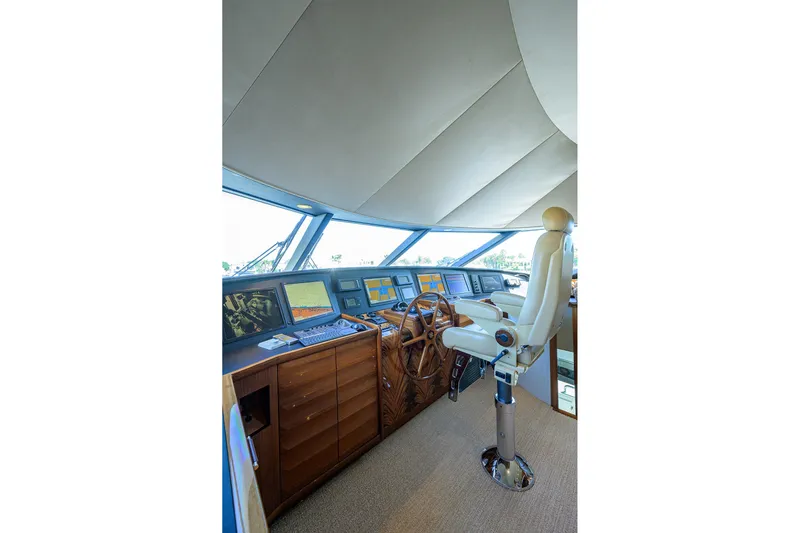 Remy Roo Yacht Photos Pics Luxurious 2014 Westport 112 yacht helm with advanced navigation systems and captain's chair.