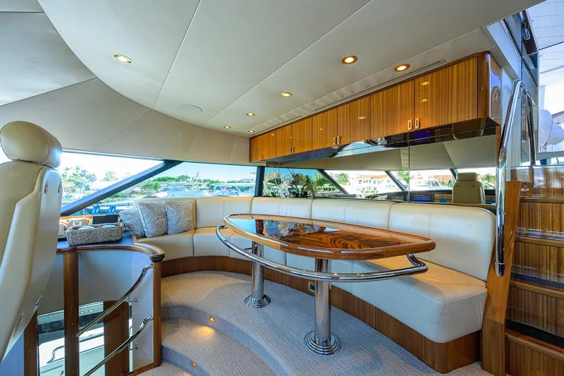 Remy Roo Yacht Photos Pics Luxurious interior of 2014 Westport 112 yacht with elegant seating and wooden finishes.