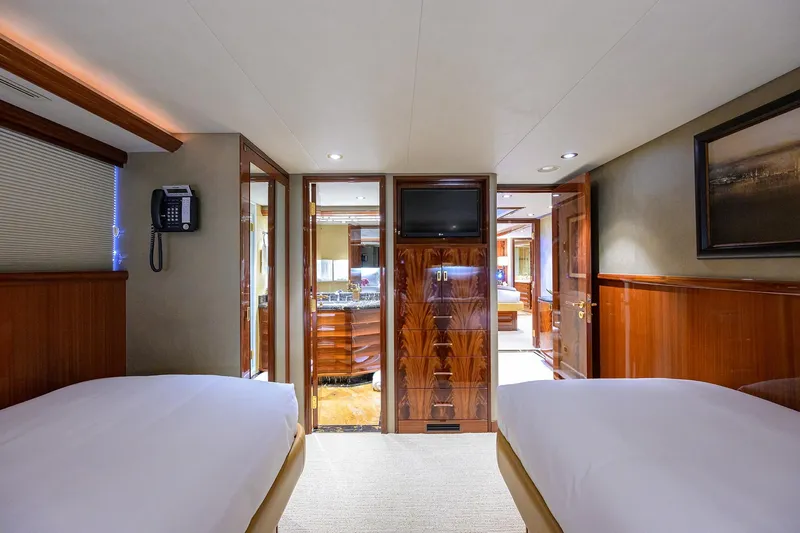 Remy Roo Yacht Photos Pics Luxurious interior of 2014 Westport 112 yacht with elegant wood finishes and modern amenities.