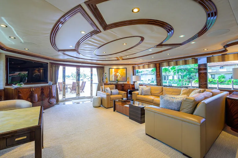 Remy Roo Yacht Photos Pics Luxurious interior of 2014 Westport 112 yacht with elegant seating and large windows.