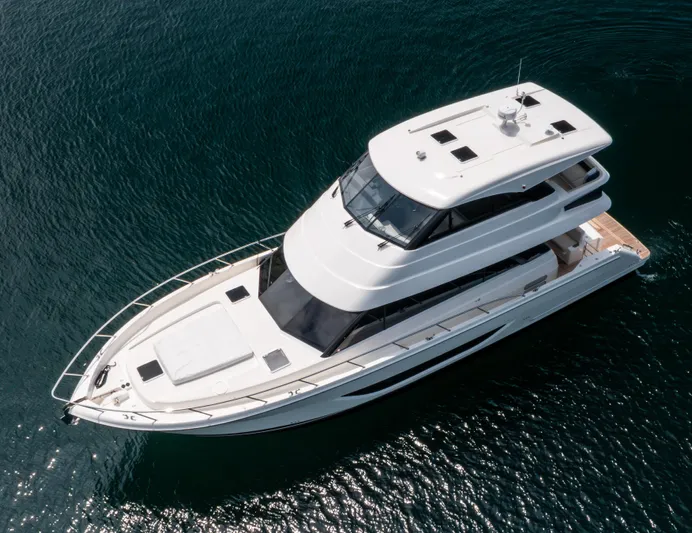 One More Yacht Photos Pics 2024 Maritimo M55 yacht on open water, aerial view.