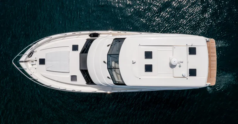 One More Yacht Photos Pics Aerial view of 2024 Maritimo M55 yacht on clear blue water.
