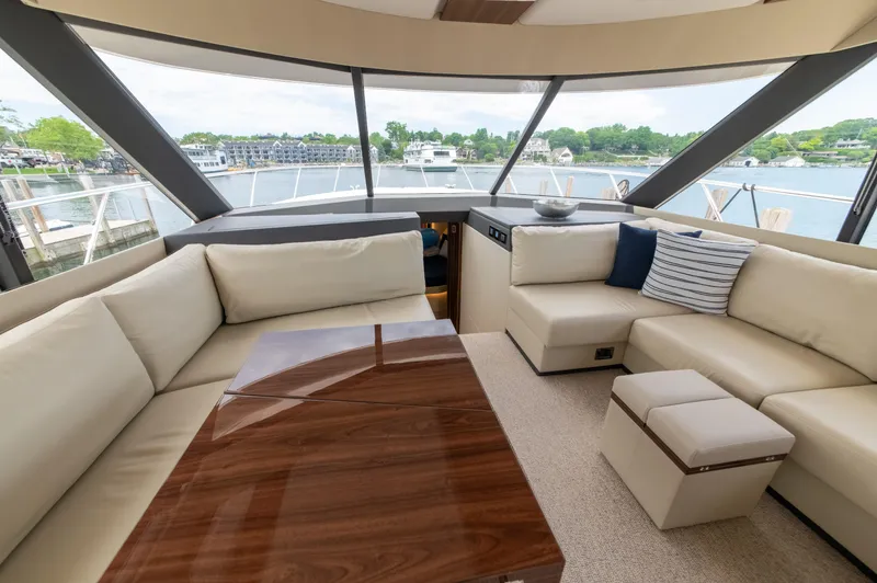 One More Yacht Photos Pics Luxurious interior of 2024 Maritimo M55 yacht with elegant seating and scenic views.