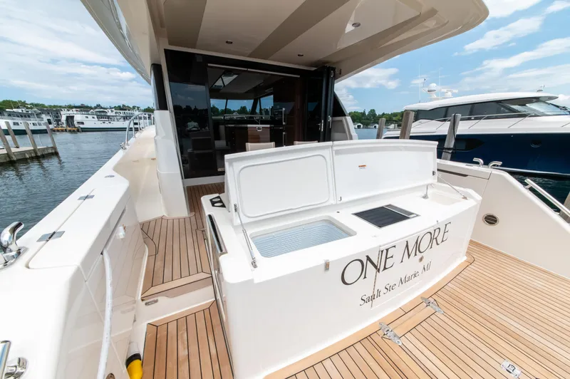 One More Yacht Photos Pics 2024 Maritimo M55 yacht with open deck, docked at marina.