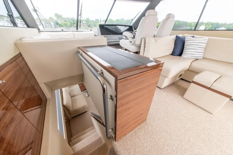 One More Yacht Photos Pics Luxurious interior of 2024 Maritimo M55 yacht with elegant seating and modern design.