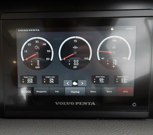 One More Yacht Photos Pics Volvo Penta engine display on 2024 Maritimo M55 yacht dashboard, showing gauges and controls.