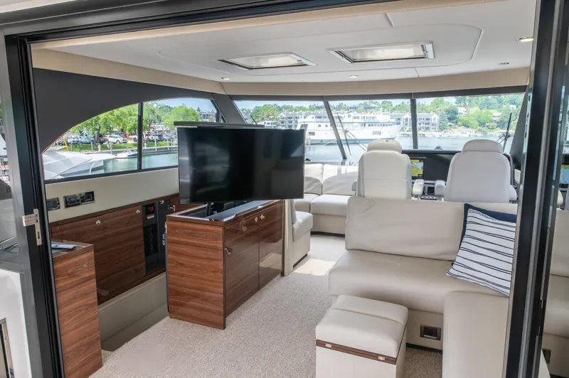 One More Yacht Photos Pics Luxurious interior of 2024 Maritimo M55 yacht with modern furnishings and scenic views.