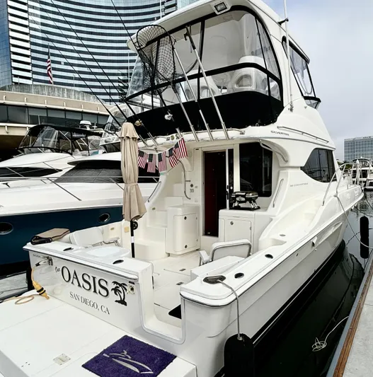  Yacht Photos Pics 2004 Silverton 38 Convertible yacht docked in San Diego marina.