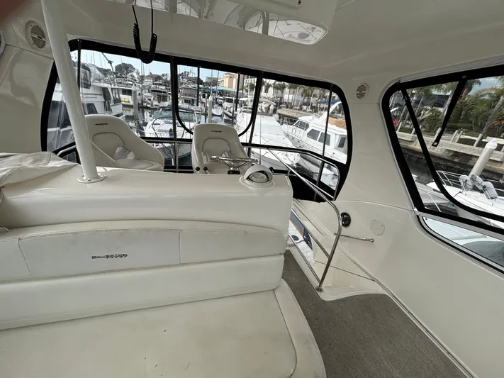  Yacht Photos Pics Interior of 2004 Silverton 38 Convertible yacht with marina view.