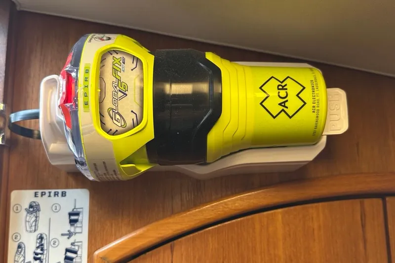 Free Range Yacht Photos Pics ACR GlobalFix V5 EPIRB mounted on 2005 Hunter 44 yacht interior.